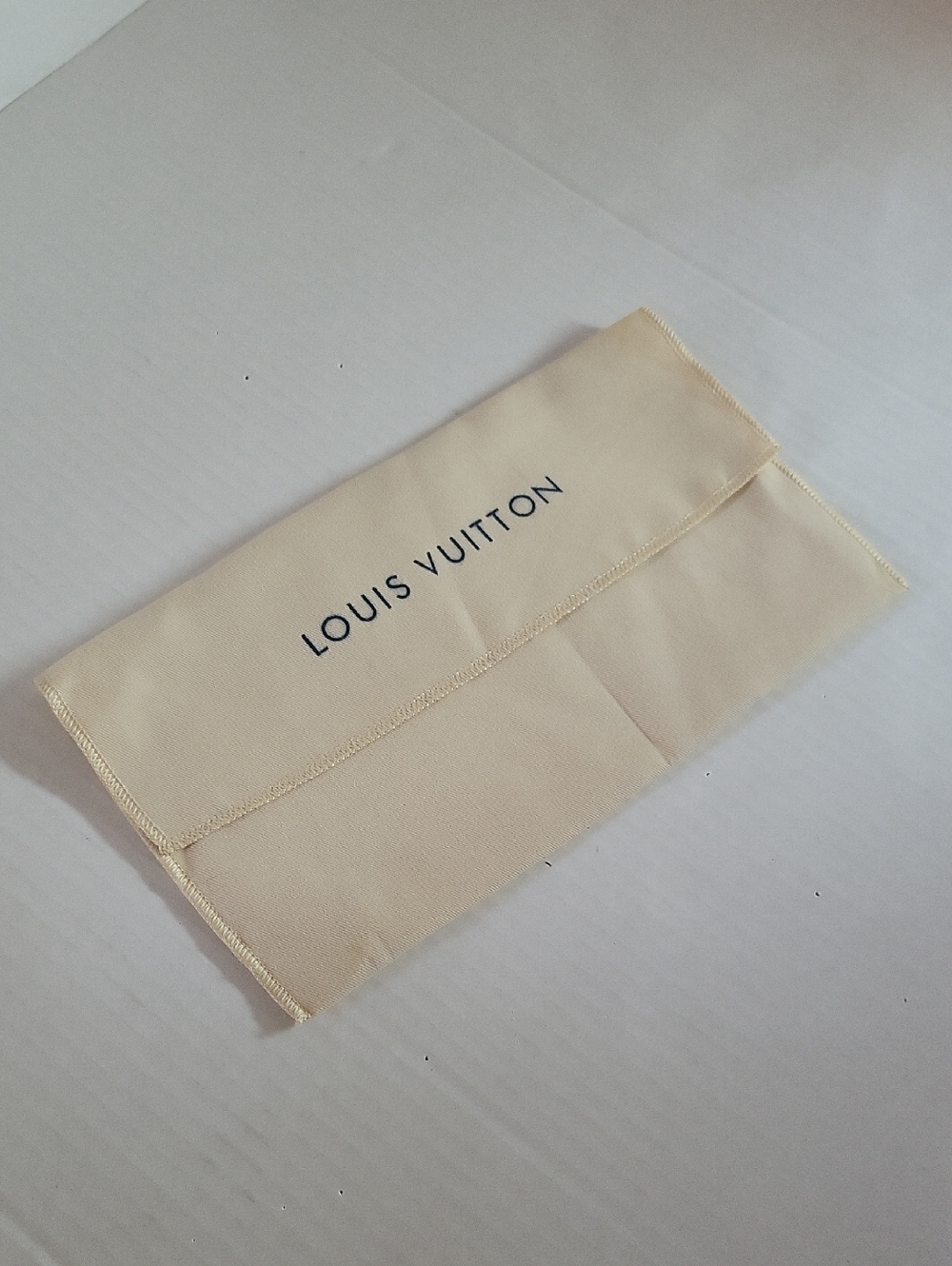 Louis Vuitton Cream Storage Pouch with Black Logo